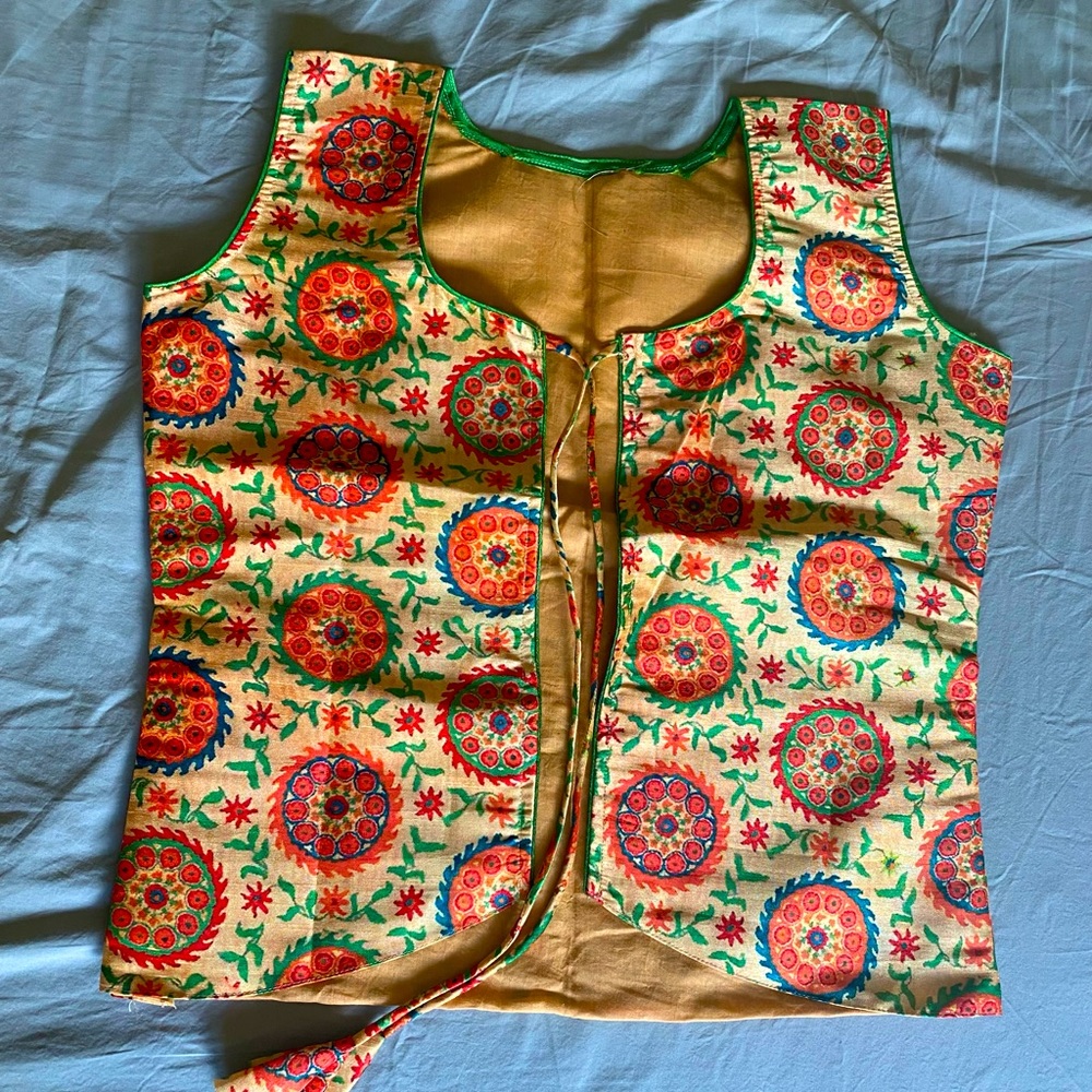 pure silk jacket with sleeves on side that you can wear under blouse/top/T-shirt